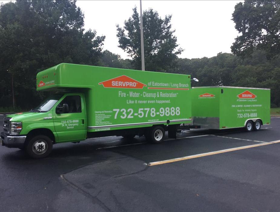SERVPRO truck and trailer in the parking lot