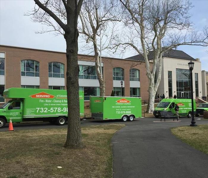 Servpro Trucks in front of Office Building
