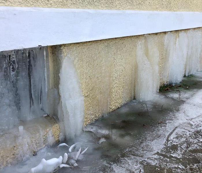 A leak turns into icicles on a home. 