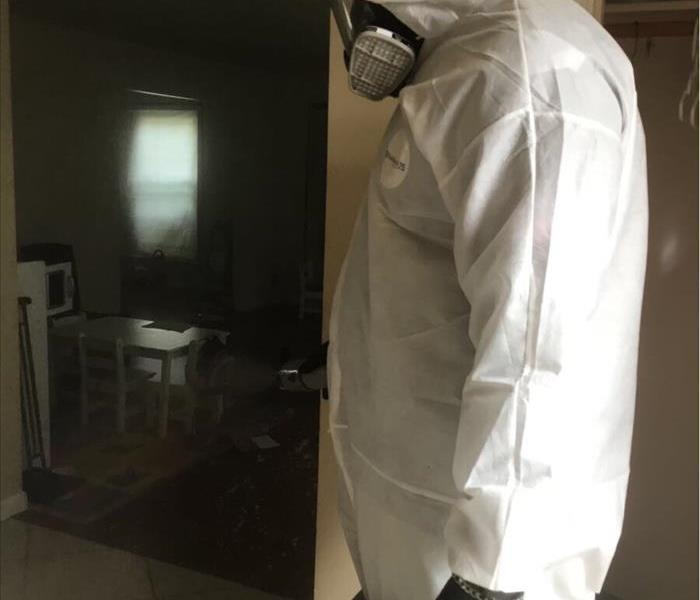 Man wearing Tyvek protective suits